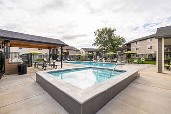 Seasonal outdoor heated pool, spa & sun deck area